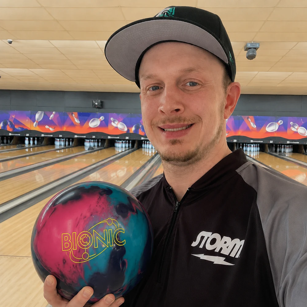 Randy DeBolt holding a bowling ball at a bowling center